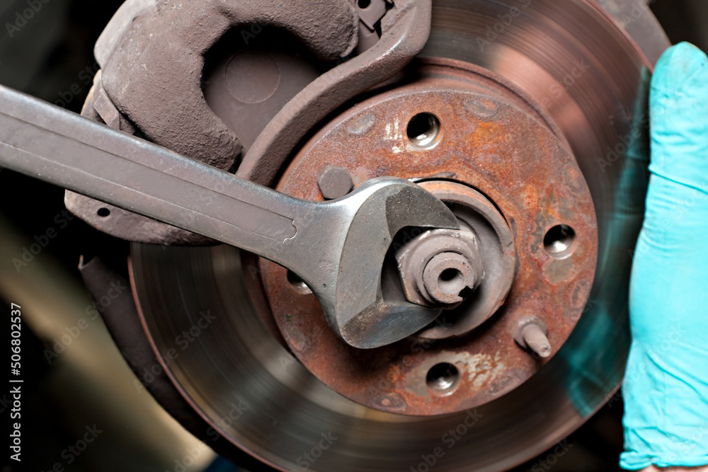 Mechanic car service auto garage in automotive mobile center. Technician workshop repair engine motor. Mechanic car service auto garage in automotive mobile center. Technician workshop repair engine motor.