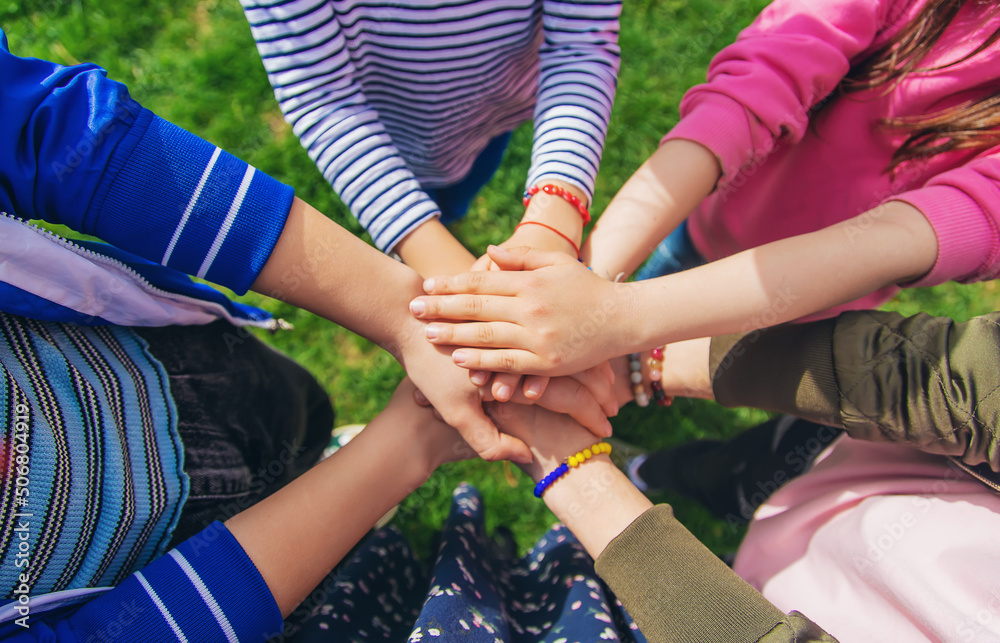 People put their hands together. Selective focus. People put their hands together. Selective focus.