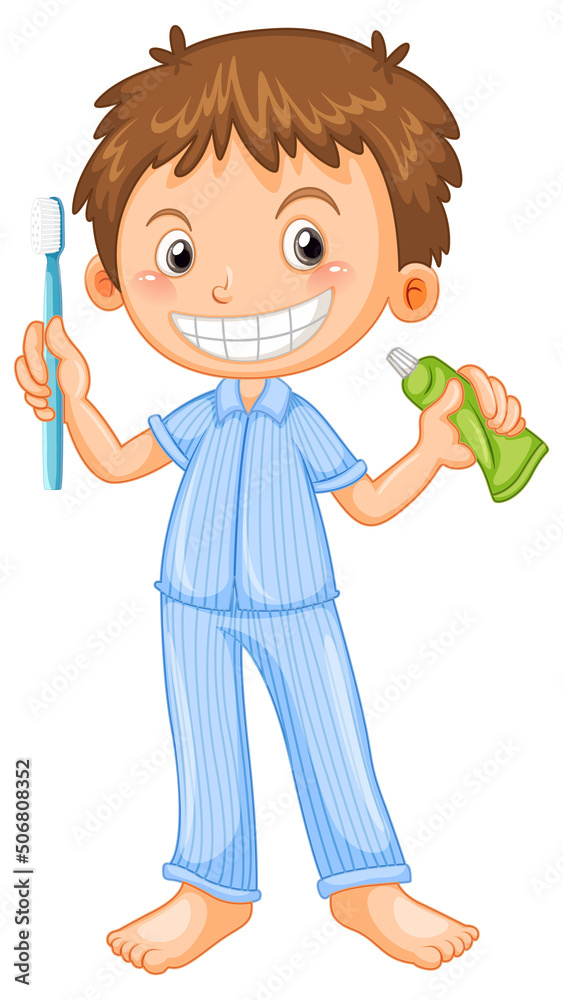 Boy in pyjamas holding toothbrush and toothpaste Boy in pyjamas holding toothbrush and toothpaste