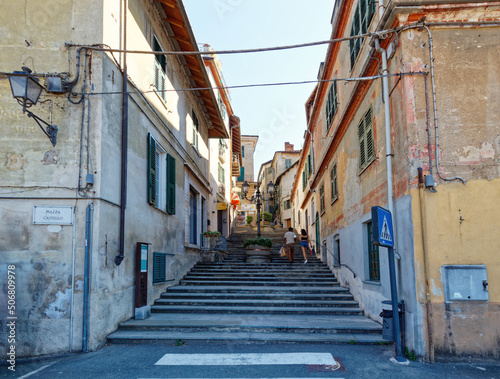 Ovada, Piedmont, Italy - June 27, 2021: staircase leading from Piazza Castello to the historic center of the town © Marco