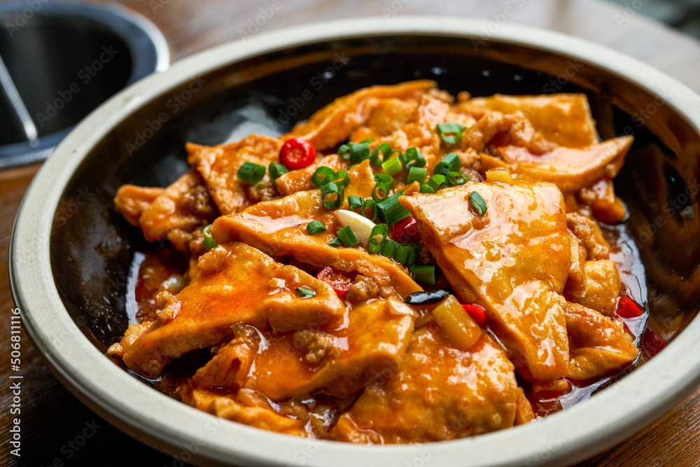 A classic and delicious Chinese dish, braised farm tofu in sauce A classic and delicious Chinese dish, braised farm tofu in sauce
