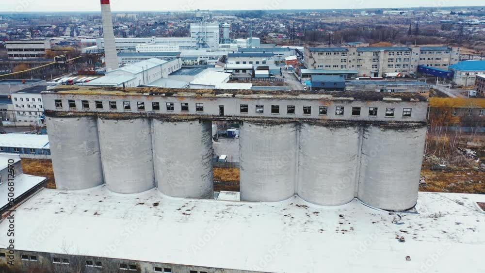 Big chemical factory. Aerial view of an old building against the backdrop of a new modern factory. Big chemical factory. Aerial view of an old building against the backdrop of a new modern factory.