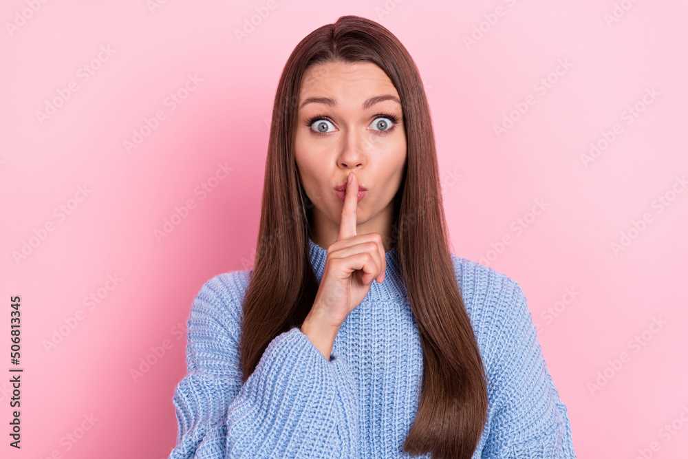 Photo of impressed young brown hairdo lady finger mouth wear blue sweater isolated on pink color background Photo of impressed young brown hairdo lady finger mouth wear blue sweater isolated on pink color background