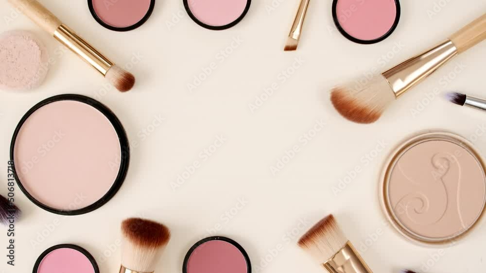 A set of decorative cosmetics on beige background. Makeup products. The beauty of the background with cosmetic facilities for the face with empty space. Makeup, the concept of skin care with. 4k
