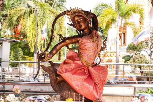 The Sculpture of the goddess of the earth twisting her hair or Thai name 