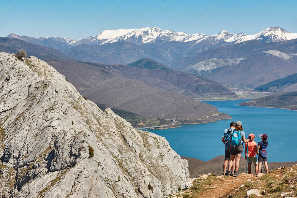 Picturesque reservoir and mountain landscape in Riano. Trekking. Spain