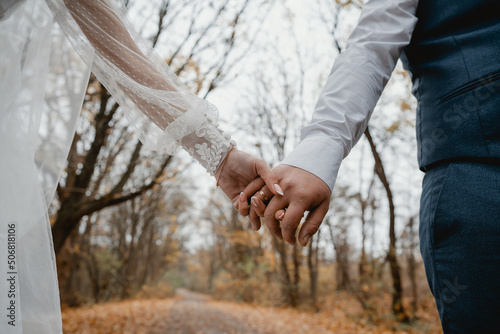 couple holding hands together