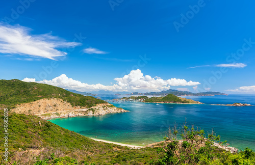 Nha Trang Bay summer days with sea light blue, cool, temperate climate, recognized most beautiful bays national scenic Vietnam, boats avoid storm far when rainy season comes. © huythoai