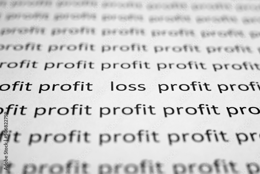 Financial problems, economic crisis concept. Printed text profit and loss on white paper close-up. Selective focus on word Loss, low angle view, macro photo Financial problems, economic crisis concept. Printed text profit and loss on white paper close-up. Selective focus on word Loss, low angle view, macro photo