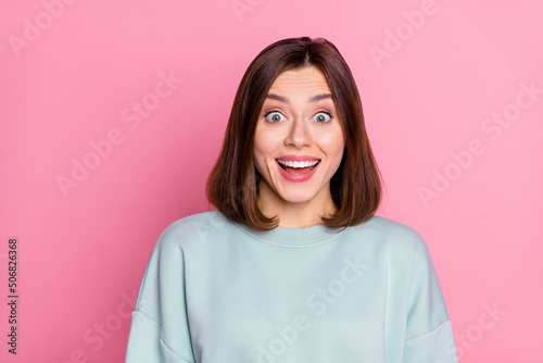Photo of young pretty impressed girl face reaction discount information isolated over pink color background