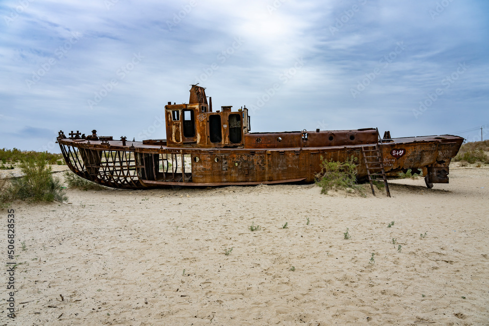 Boats cemetery around the Aral Sea. Rusty carcasses in the desert dunes where once there was water.