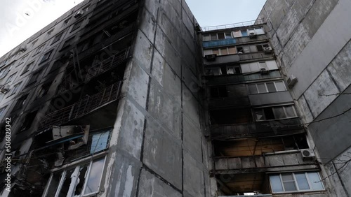 destroyed and burnt house in Mariupol