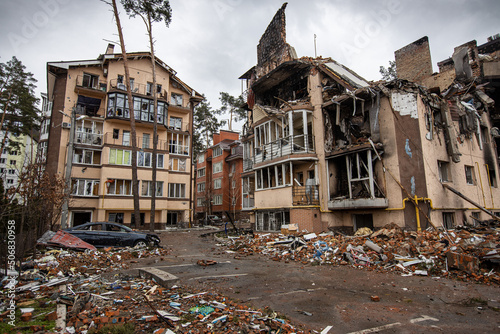 Irpin, Kyev region Ukraine - 09.04.2022: Cities of Ukraine after the Russian occupation. Destroyed buildings on the streets of Irpen. Broken, shelled windows. Buildings after being hit by missiles. #506830958