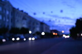 evening city street blurred bokeh background view