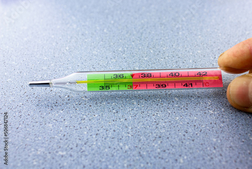 Thermometer for thermometry. Mercury thermometer.Glass thermometer close-up.Disease symptoms concept.