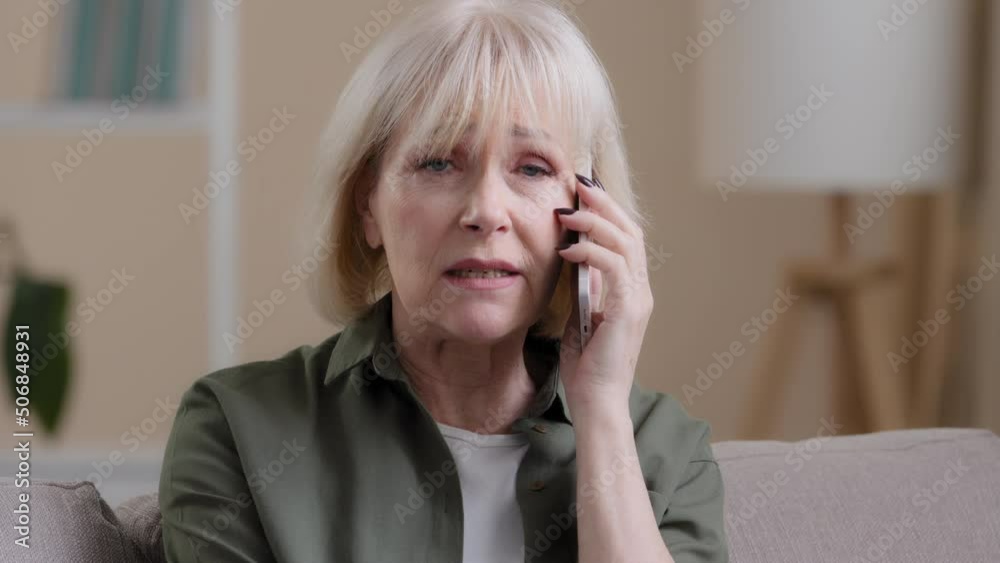 Portrait old caucasian woman angry senior lady furious frustrated annoyed mature female talking mobile phone calling conflict misunderstanding quarrel unpleasant conversation communication problems Portrait old caucasian woman angry senior lady furious frustrated annoyed mature female talking mobile phone calling conflict misunderstanding quarrel unpleasant conversation communication problems