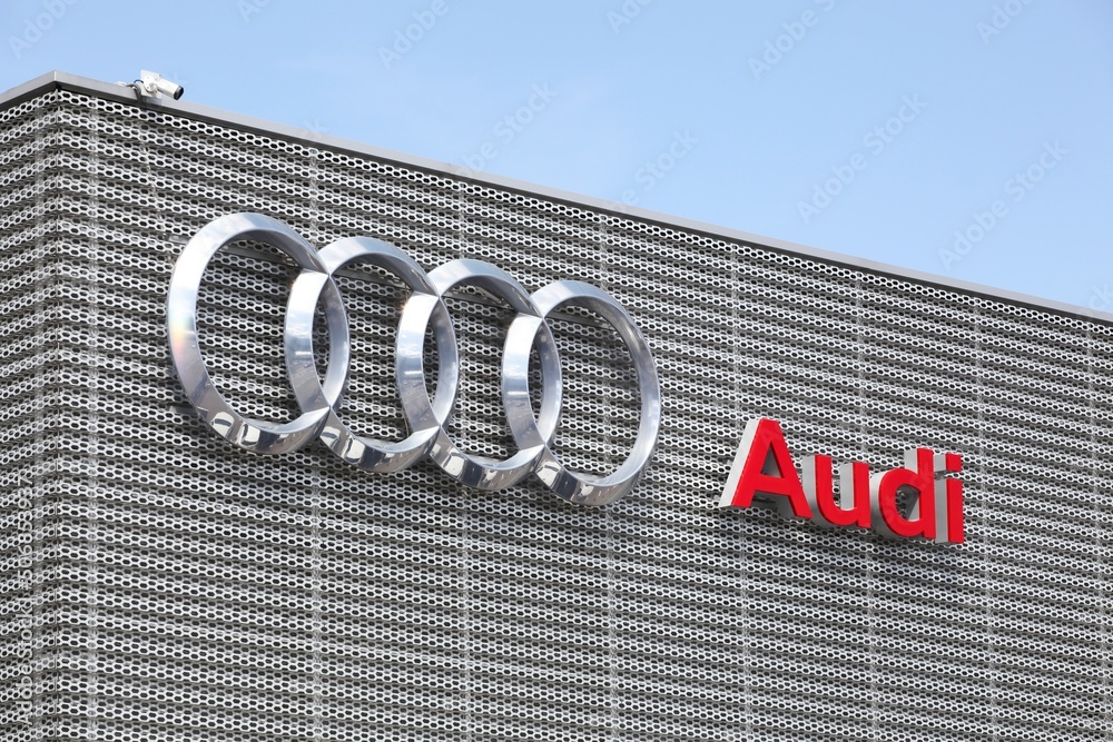 Grenoble, France - June 16, 2019: Audi logo on a building. Audi is a German  automobile manufacturer that designs, engineers, produces, markets and  distributes luxury vehicles Stock Photo