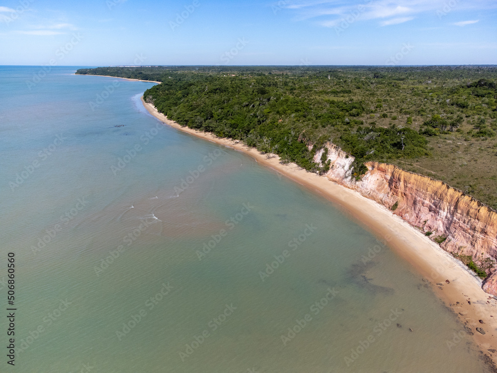 Amazing long cliffs of Bahia, Brazil, South America. Beach, sea, ocean. Image for geography studies and classes.