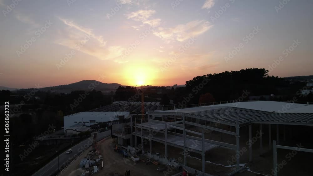 Fly Above Industrial Building Construction with Crane Fly Above Industrial Building Construction with Crane
