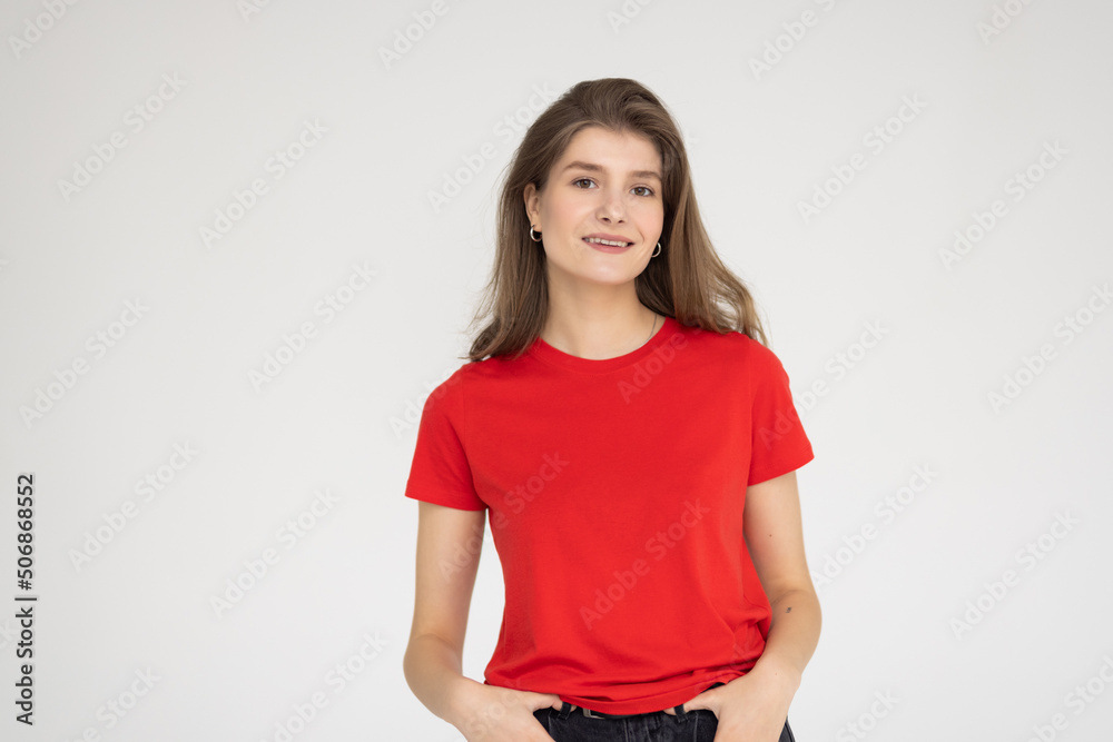 Smiling young woman isolated over white background Smiling young woman isolated over white background