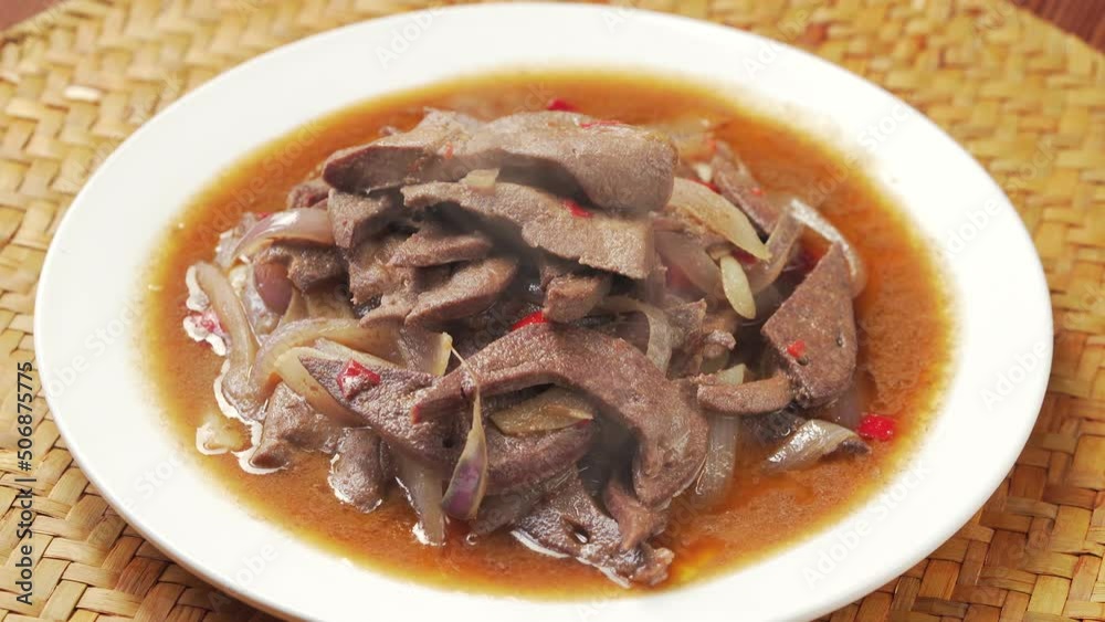 Sichuan-style home cooking - fried pork liver with onions Sichuan-style home cooking - fried pork liver with onions