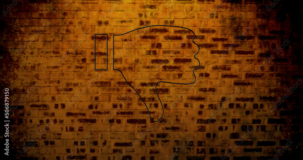 Image of glowing neon thumb down icon on brick wall