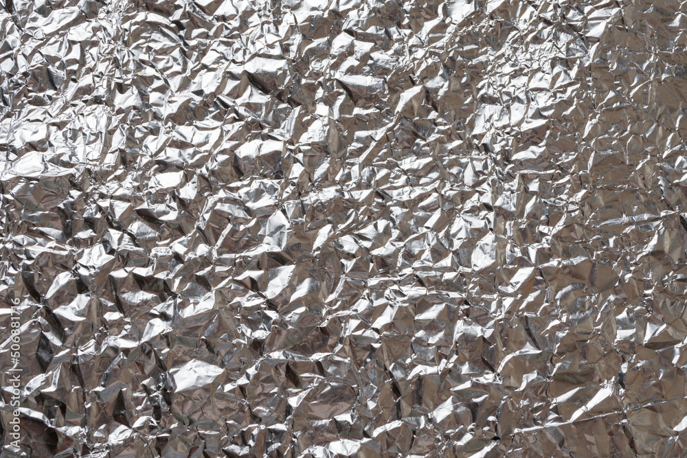 Shiny metal silver foil texture for background, Abstract crumpled foil background, metallic foil texture Shiny metal silver foil texture for background, Abstract crumpled foil background, metallic foil texture