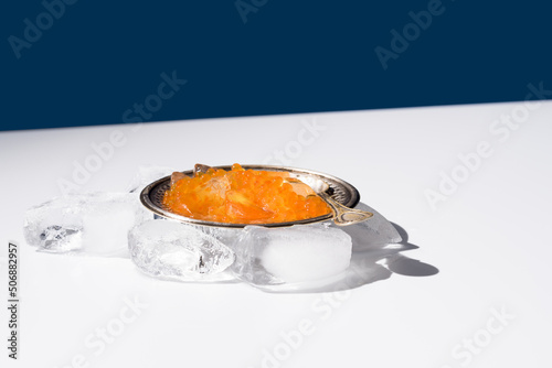 Tobiko caviar served on silver plate