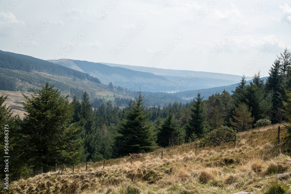 A landscape image taken on a sunny day in the Welsh valley countryside.