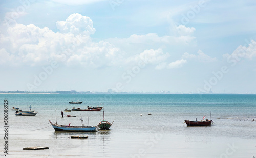 fisherman boats travel on ocean in sea landscape © Yanukit