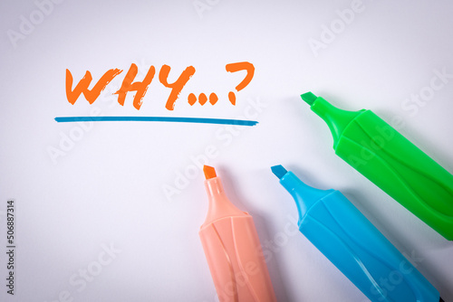 Text why and colored markers on a white background