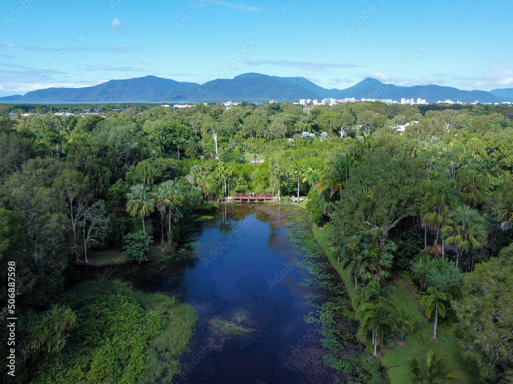 Aerial view of Cairns botanical gardens, city and mountains in Aerial view of Cairns botanical gardens, city and mountains in