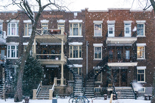 Wallpaper Mural view on Montreal'S Plateau Mont Royal typical apartments buildings during a snowfall day in Quebec, Canada Torontodigital.ca