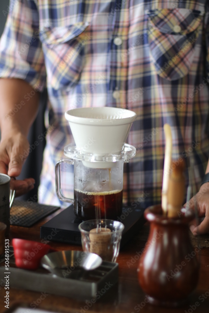 Barista brewing coffee, method pour over, drip coffee