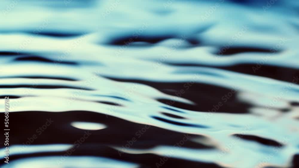 Water surface dark blue texture with clean ripples and wave refraction ...