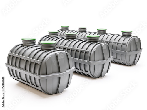 Three household septic tanks of different sizes on white photo
