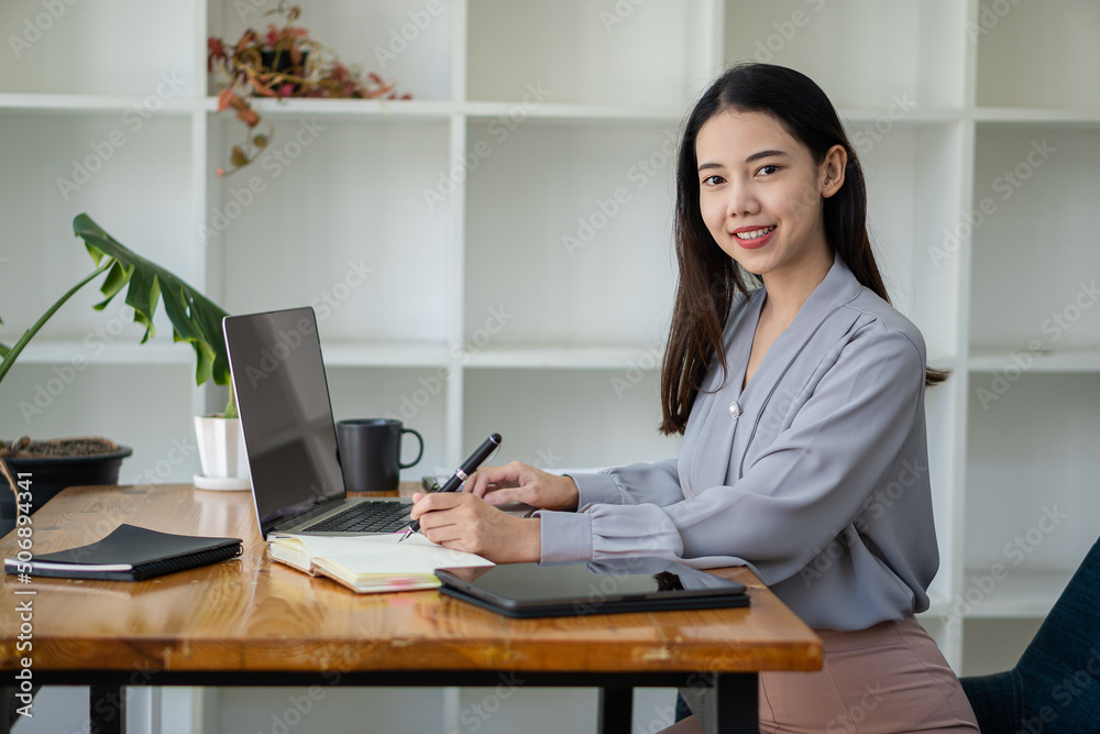Beautiful Asian girl side view celebrates with successful laptop happily ecommerce university study internet technology or start up small business ideas Beautiful Asian girl side view celebrates with successful laptop happily ecommerce university study internet technology or start up small business ideas