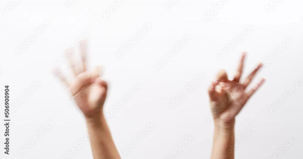 Hand showing OK thumbs up scissors victory chroma key isolated on a white studio background with copy space for place a text for advertisement. Hand showing OK thumbs up scissors victory chroma key isolated on a white studio background with copy space for place a text for advertisement.