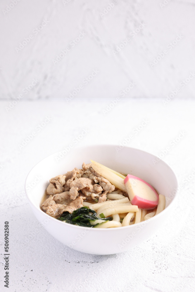Udon noodles with pork isolated in white background Udon noodles with pork isolated in white background