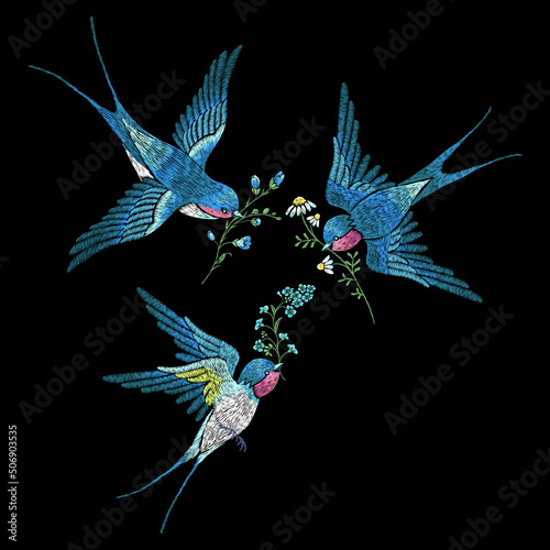 Embroidery trend floral pattern with swallows, chamomiles and forget- me-nots.