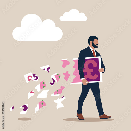 Businessman holding big pound banknote money while loss, crumble and reduce in value. Lose money pound investment in financial crisis, profit and loss in business or deflation and inflation concept.
