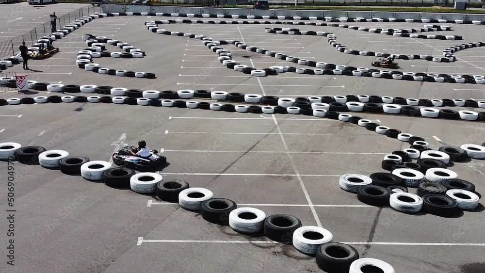 Karting on a karting track, drone view of the racer during the race