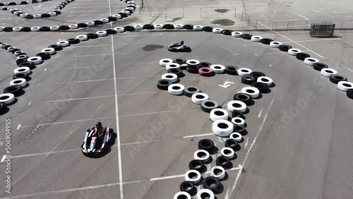 Karting on a karting track, drone view of the racer during the race