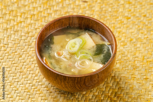 Japanese seafood miso soup in wooden bowl