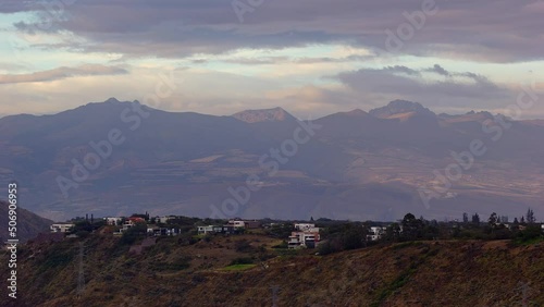 4K Timelapse Sequence of Quito, Ecuador - The mountains with houses in the ecuadorian capital from day to night