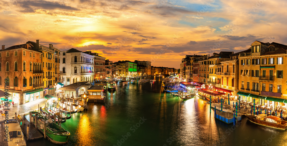 The Grand Canal buildings in twilight, view from Rialto Bridge, famous landmark of Venice, Italy