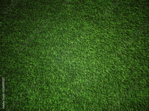 green grass texture.The texture of green artificial grass. Covering for sports stadiums and decorations. Background and texture.Close-up image of fresh spring green grass.
