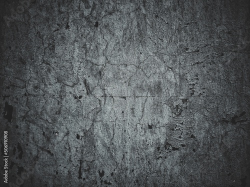 Distressed texture in soft blended brush strokes with white grunge stains and border gray background.background or texture with scratches and cracks.Scratched Wall texture background,grunge rough.