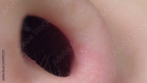 Male nostril of the nose close-up macro. Human breathing, Selective focus