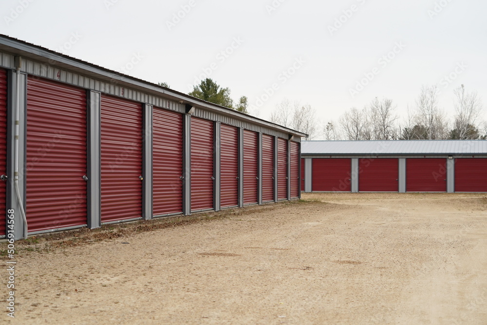 Red storage unit buildings site outside of Fond du Lac, Wisconsin holding owers property.